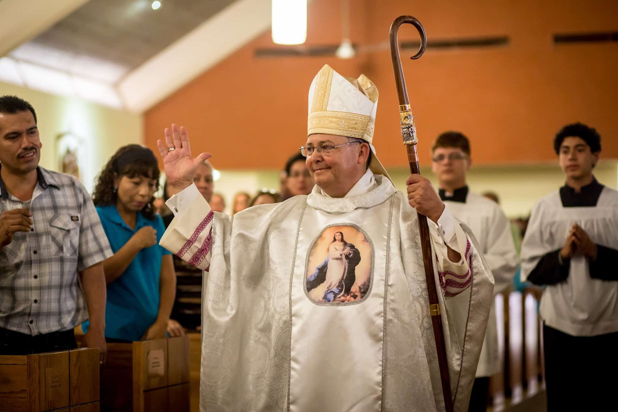 Auxiliary Bishop Eduardo A. Nevares greets parishioners during the Consecrated Life Celebration on Sunday, November 1, 2015 at St. Vincent De Paul Parish.