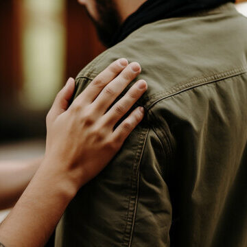 Hand On Shoulder